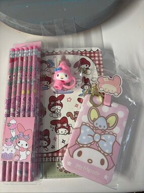 My Melody - 8x5 soft notebook, pencils, Badge/Luggage Holder and straw topper.
